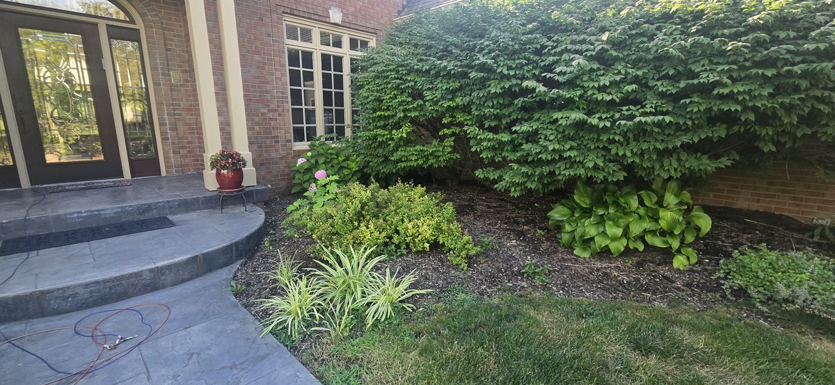 Natural stone rock bed garden installation