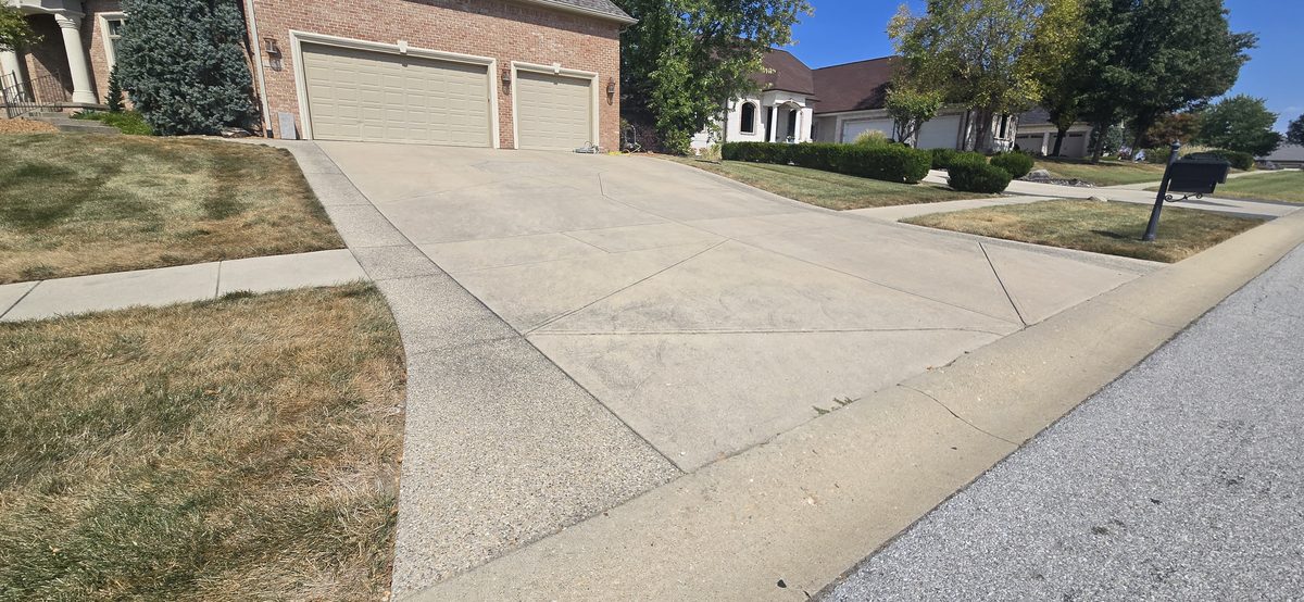 Clean driveway after power washing